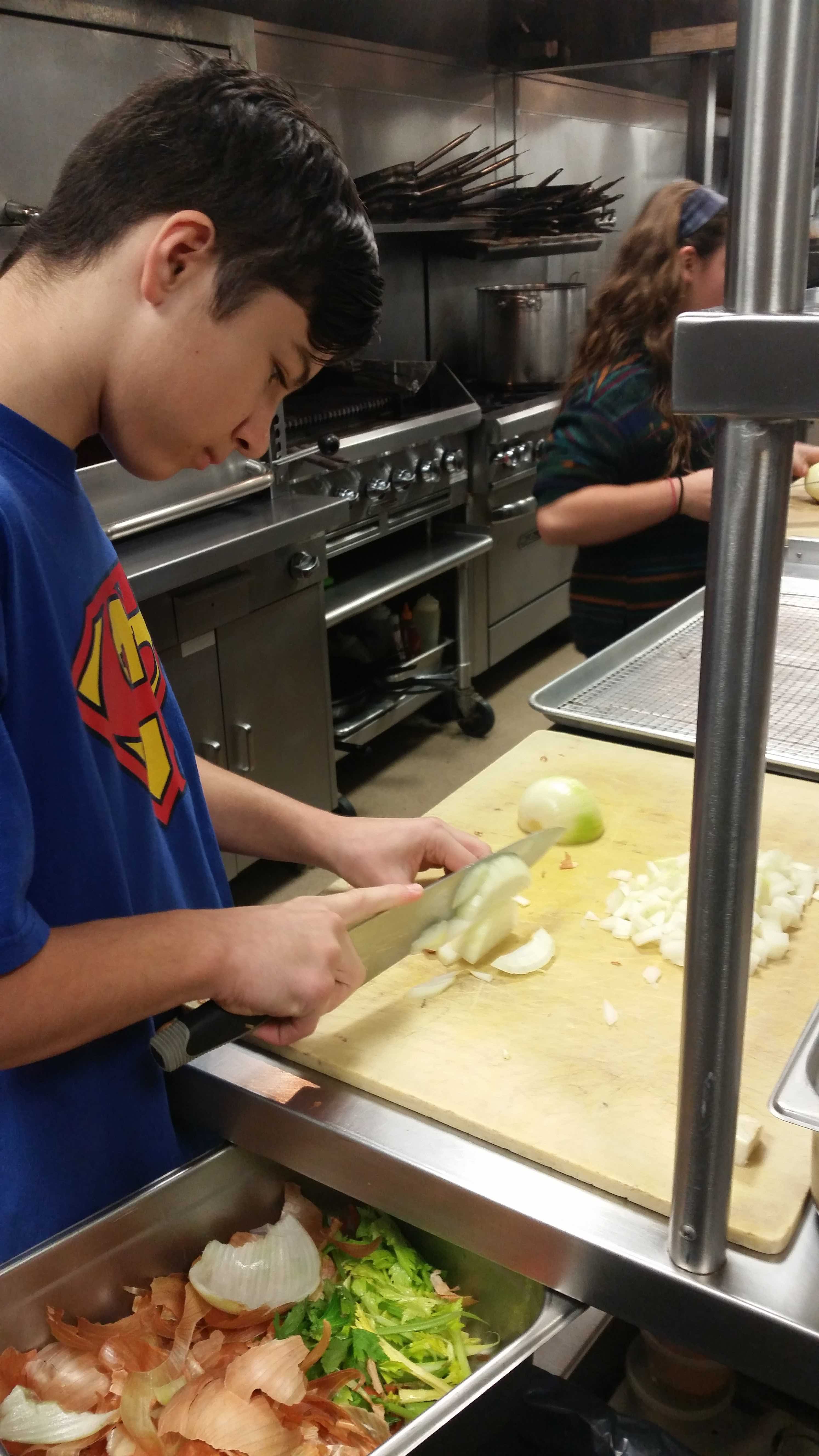 Ridge and Valley Charter School student andrew at soup kitchen